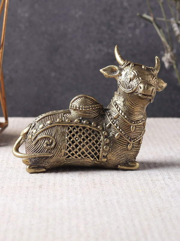 Brass sitting cow idol of Kamadhenu, hand-cast 10.5 inch figurine, front view