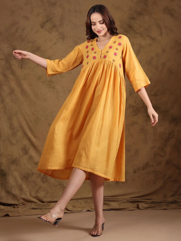 Chikankari empire-line gathered dress in cotton with floral bakhiya embroidery front view