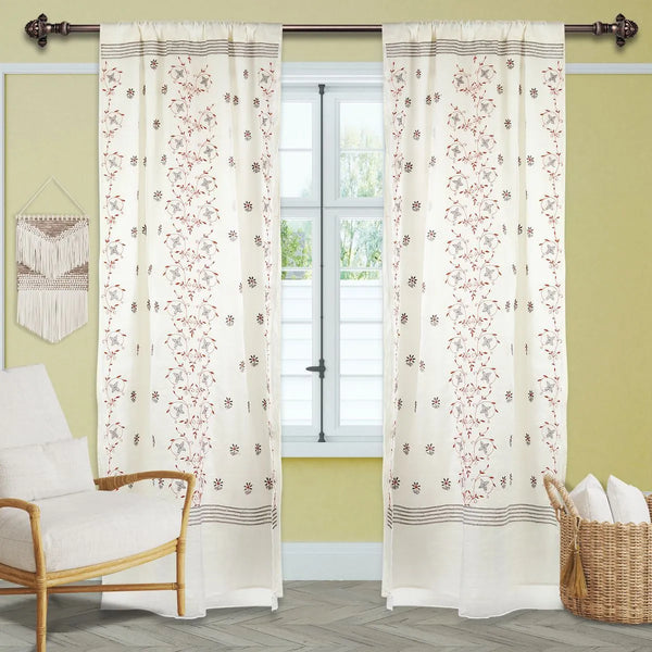 Hand-embroidered floral Chikankari curtain from Lucknow hung at a sunlit window