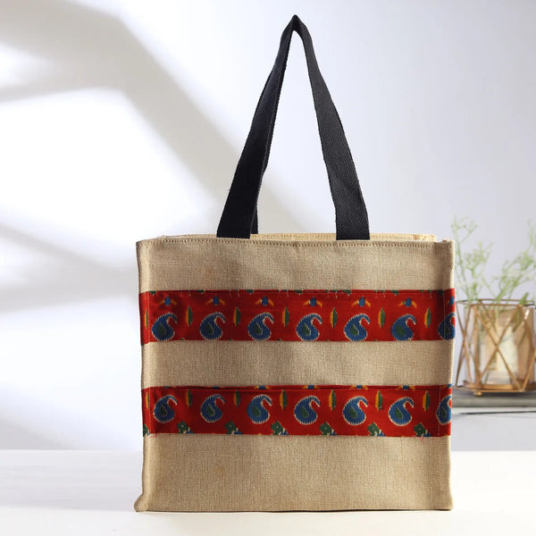 Kalamkari handbag in handcrafted cotton with floral motifs in classical palette