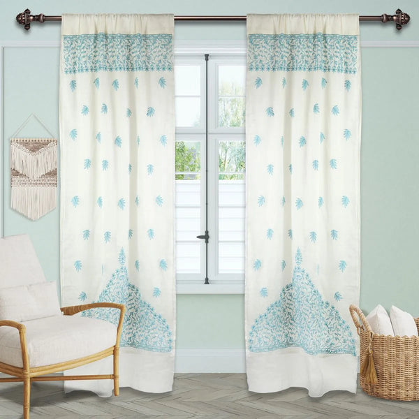 Leaf Chikankari curtain hung at a window with morning light revealing white-on-white leaf embroidery