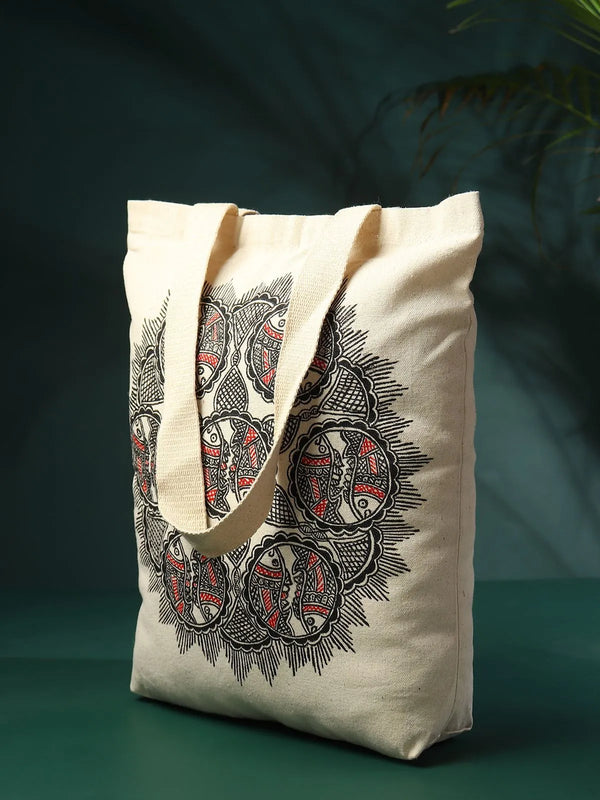 Madhubani fish jhola bag in cotton canvas with the matsya motif worked by hand across the front panel