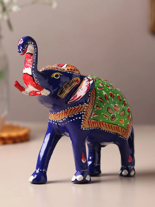 Green Meenakari elephant showpiece in handpainted metal with floral enamel motifs, Jaipur Rajasthan