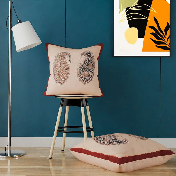 Paisley buta motif cushion cover pair on natural cotton base, front view