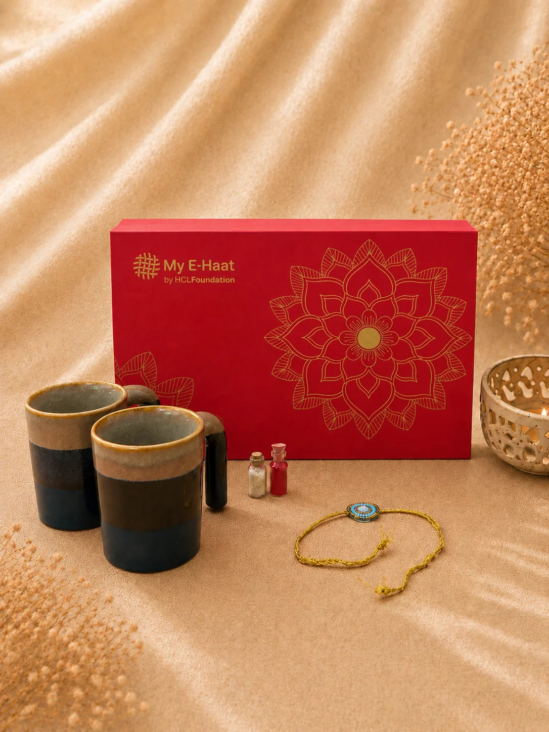 Rakhi Hamper for Him featured image with branded red gift box, two handcrafted ceramic mugs and rakhi - My E-Haat by HCL Foundation