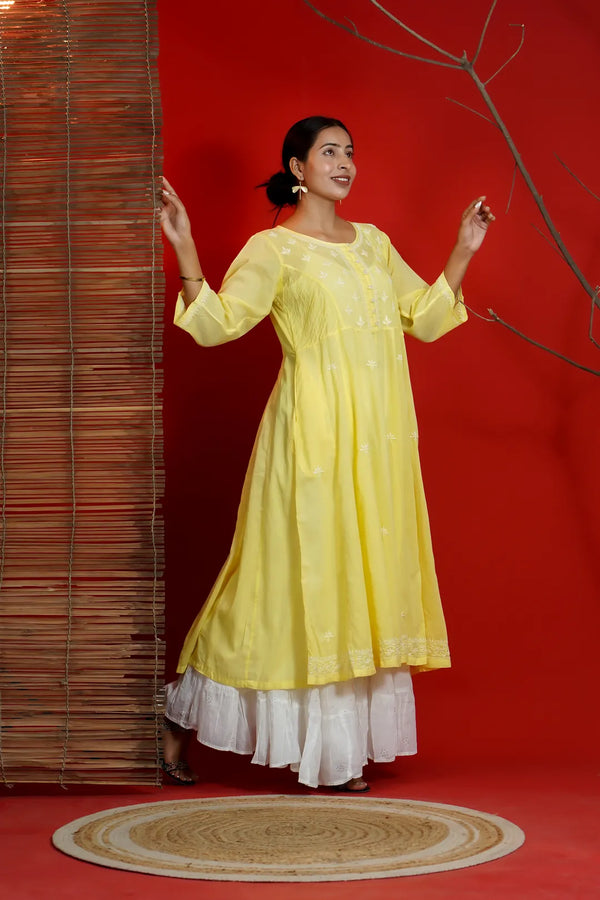 Close-up of Lucknowi Chikankari shadow stitch on yellow Anarkali kurta