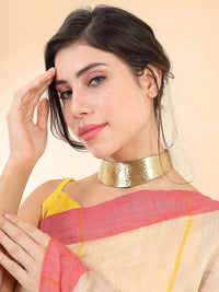Textured brass hasuli necklace, rigid collar form, handcrafted Indian neckpiece