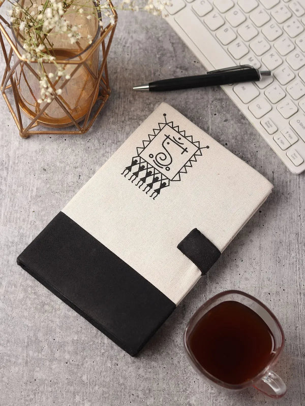Warli diary with geometric Warli art on handmade paper cover, front view, 8 by 10 inches