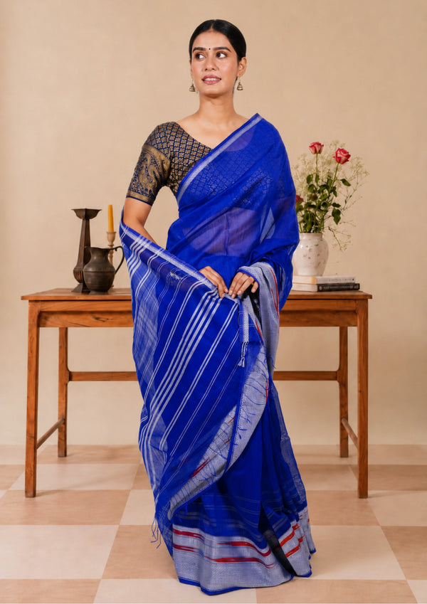 Cobalt blue Maheshwari saree striped in bold silver, finished with a fringed pallu
