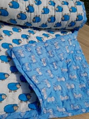 Blue and white sheep and cow design 100% cotton hand block printed kids quilt.