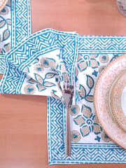 Blue and white color organic cotton place mats, table runner and napkins set,, hand block printed in India with vibrant floral design.